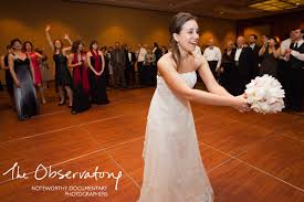 Bride tossing flowers